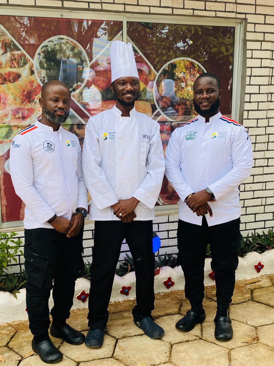 Three chef instructors in uniform at the culinary institute